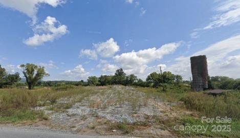 a view of a lake with a big yard