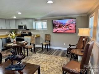 1638 Hughes Gap Road Bakersville, NC 28705 - Photo 6 of 12 a view of a dining room with furniture