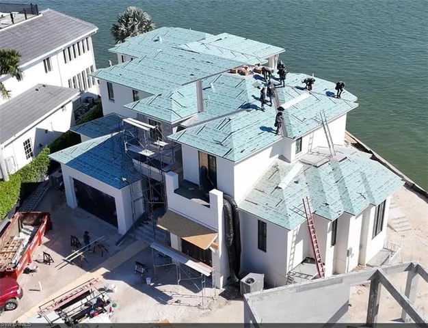 a terrace of a house with outdoor seating