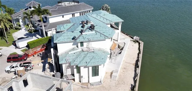 a vase of flowers sitting on a table