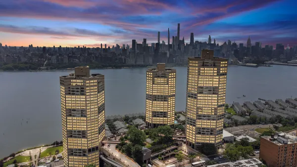 a view of a city with tall buildings