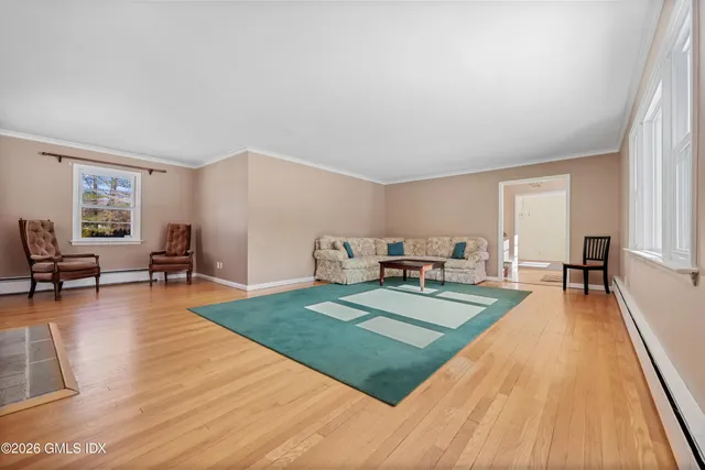 a view of a living room and dining room