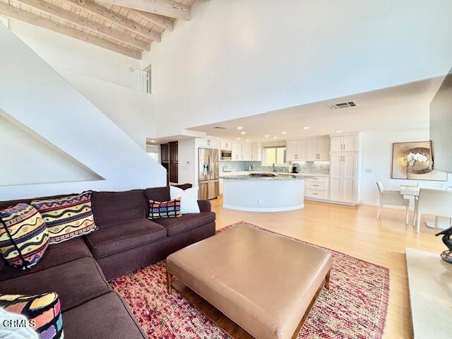 3521 Sunset Lane Oxnard, CA 93035 - Photo 13 of 37 a living room with furniture and view of kitchen