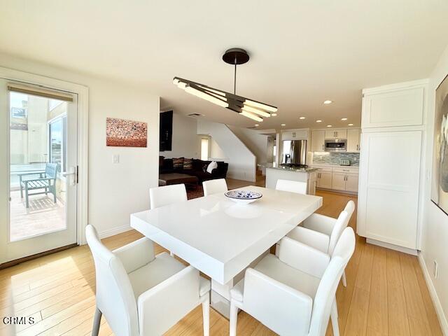 3521 Sunset Lane Oxnard, CA 93035 - Photo 15 of 37 a view of kitchen with cabinets and wooden floor