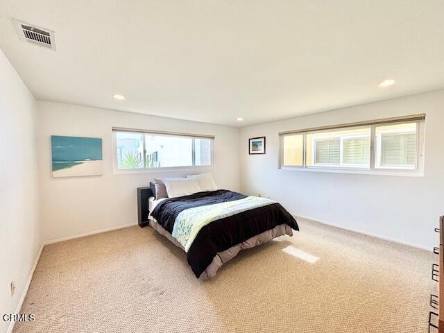 3521 Sunset Lane Oxnard, CA 93035 - Photo 21 of 37 a spacious bedroom with a bed and a window