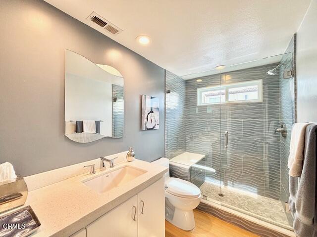3521 Sunset Lane Oxnard, CA 93035 - Photo 23 of 37 a bathroom with a sink a toilet and shower