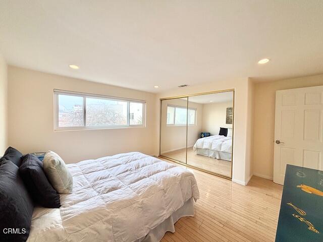 3521 Sunset Lane Oxnard, CA 93035 - Photo 25 of 37 a bedroom with a bed and a large mirror