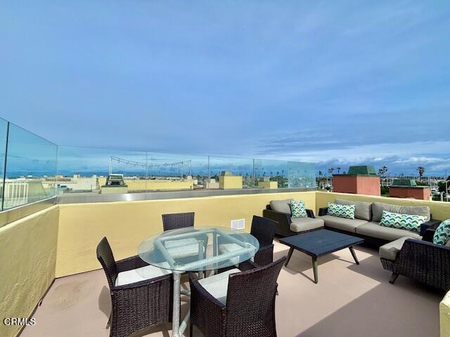 3521 Sunset Lane Oxnard, CA 93035 - Photo 27 of 37 a terrace with outdoor seating and city view