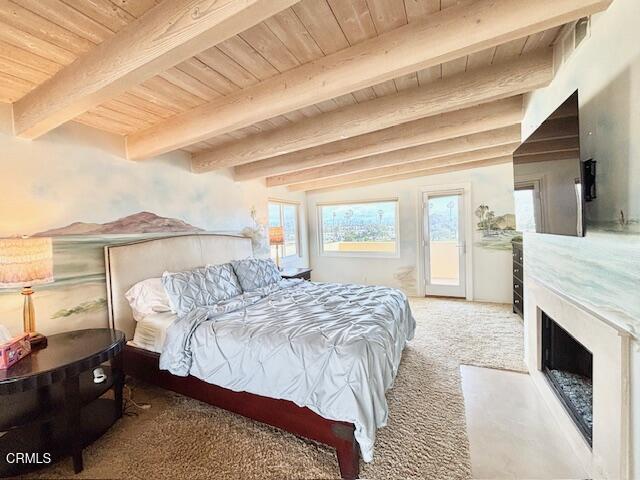 3521 Sunset Lane Oxnard, CA 93035 - Photo 29 of 37 a bedroom with a large bed and a fireplace