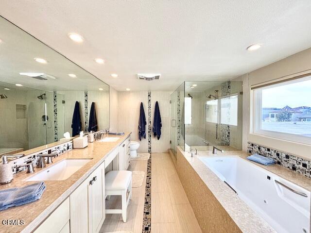 3521 Sunset Lane Oxnard, CA 93035 - Photo 32 of 37 a large bathroom with a double vanity sink and mirror