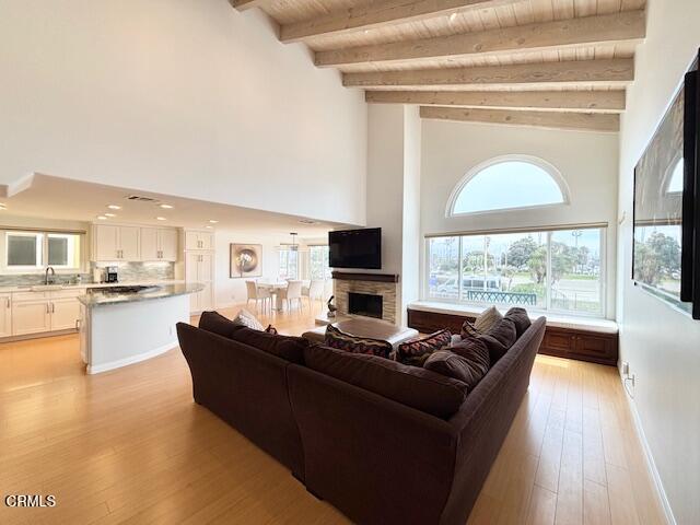 3521 Sunset Lane Oxnard, CA 93035 - Photo 9 of 37 a living room with furniture and a flat screen tv