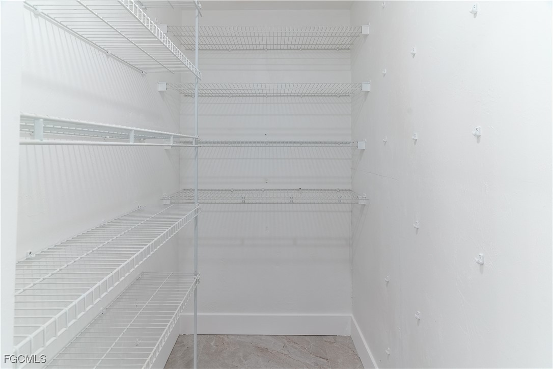 720 Chavers Street East Lehigh Acres, FL 33974 - Photo 24 of 35 a view of a store room