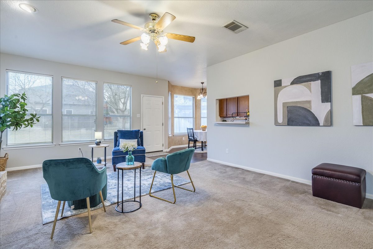 1706 Apache Trail Round Rock, TX 78665 - Photo 12 of 38 Check out the wall of windows in the Family Room! Plenty of natural light!