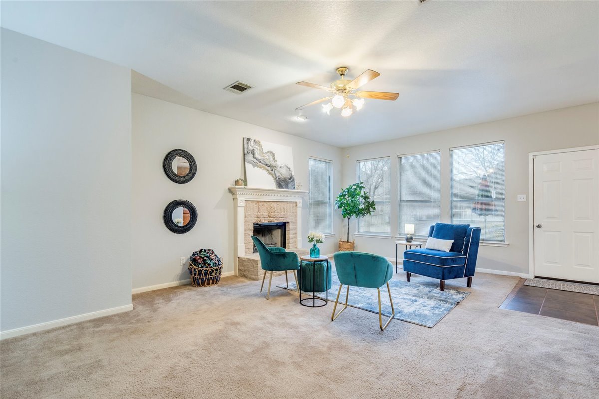 1706 Apache Trail Round Rock, TX 78665 - Photo 13 of 38 The Family Room also has a gas fireplace, perfect for a cozy evening.