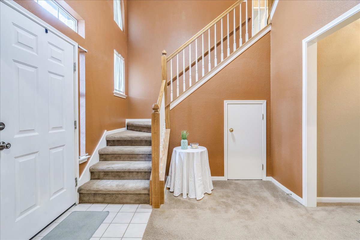 1706 Apache Trail Round Rock, TX 78665 - Photo 3 of 38 The entry way is two-story with plenty of windows and natural light.