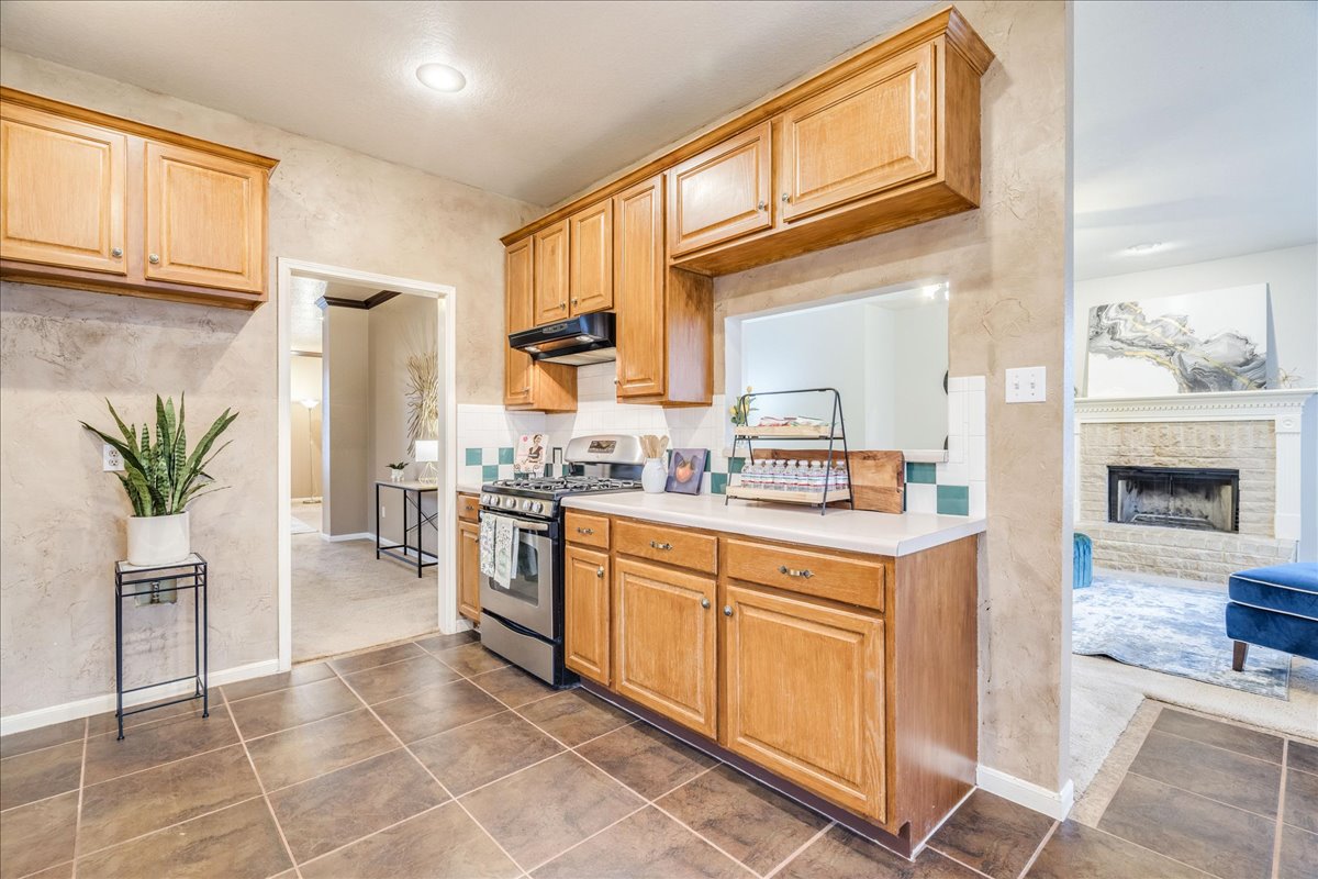 1706 Apache Trail Round Rock, TX 78665 - Photo 7 of 38 The Kitchen is galley style yet open to the Dining Room, Breakfast area, and Family Room.