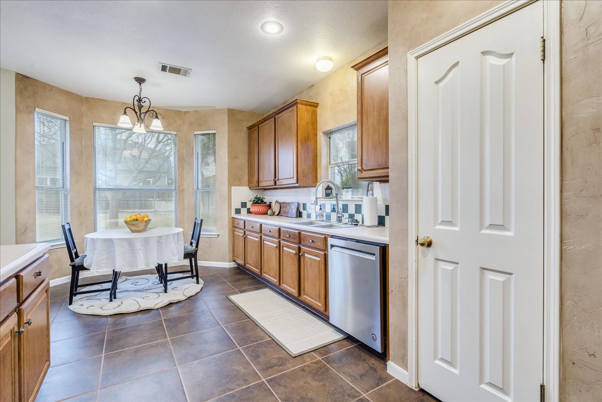 1706 Apache Trail Round Rock, TX 78665 - Photo 9 of 38 The Kitchen has an eat-in Breakfast area and a built-in pantry.