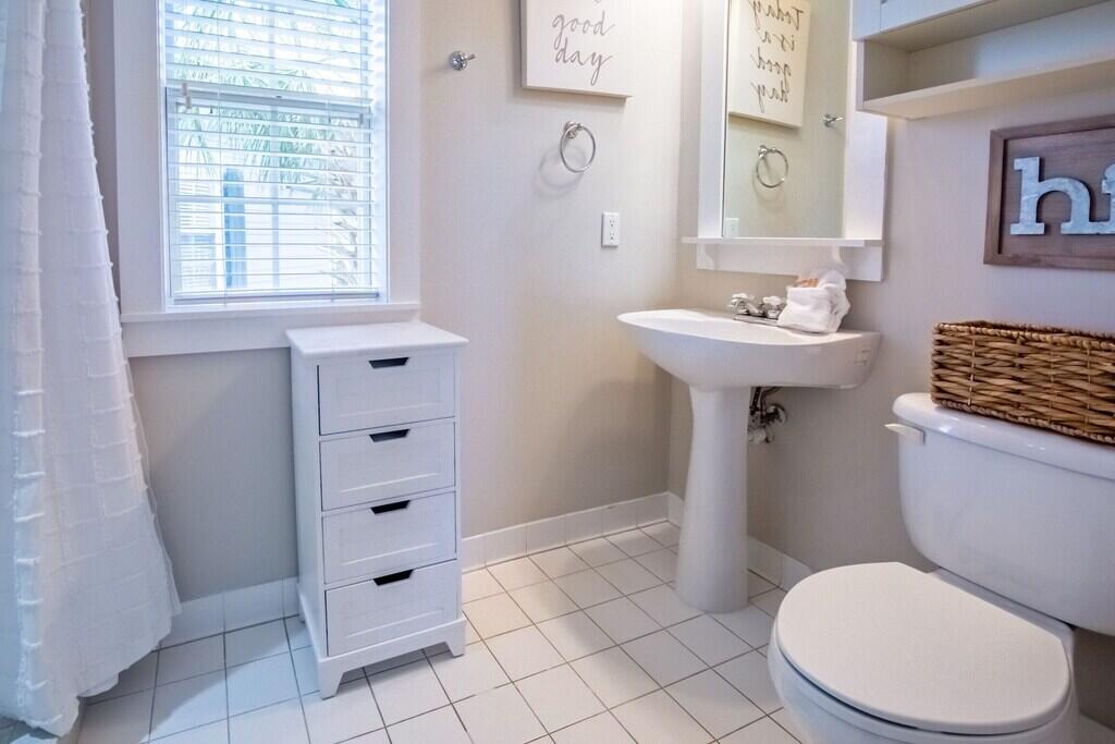 198 Somerset Bridge Road, Unit 141 Santa Rosa Beach, FL 32459 - Photo 19 of 31 a bathroom with a sink toilet and shower