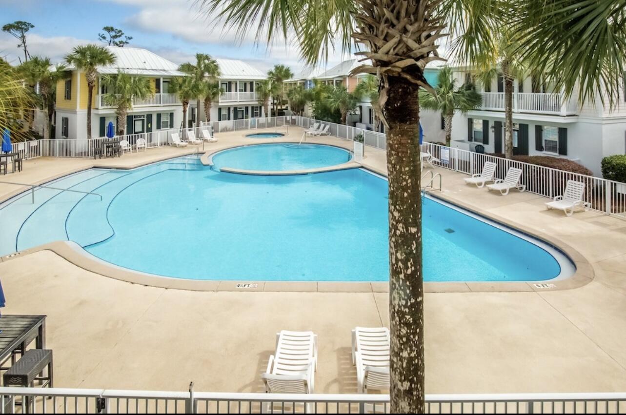 198 Somerset Bridge Road, Unit 141 Santa Rosa Beach, FL 32459 - Photo 25 of 31 a view of a swimming pool with a patio