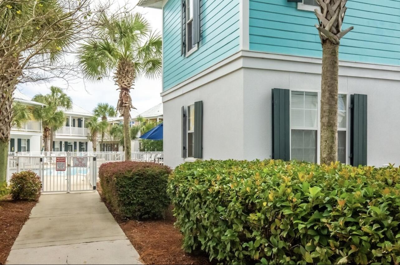 198 Somerset Bridge Road, Unit 141 Santa Rosa Beach, FL 32459 - Photo 29 of 31 a view of a house with a garden