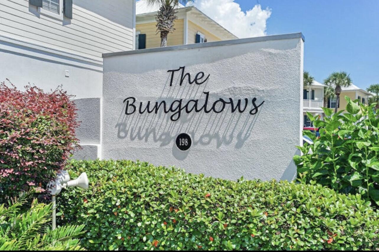 198 Somerset Bridge Road, Unit 141 Santa Rosa Beach, FL 32459 - Photo 30 of 31 a sign that is on the side of a building