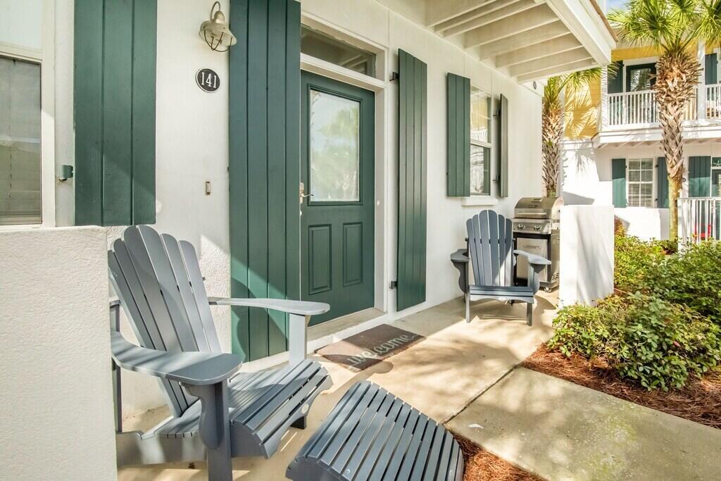 198 Somerset Bridge Road, Unit 141 Santa Rosa Beach, FL 32459 - Photo 3 of 31 a balcony view with a chair and table