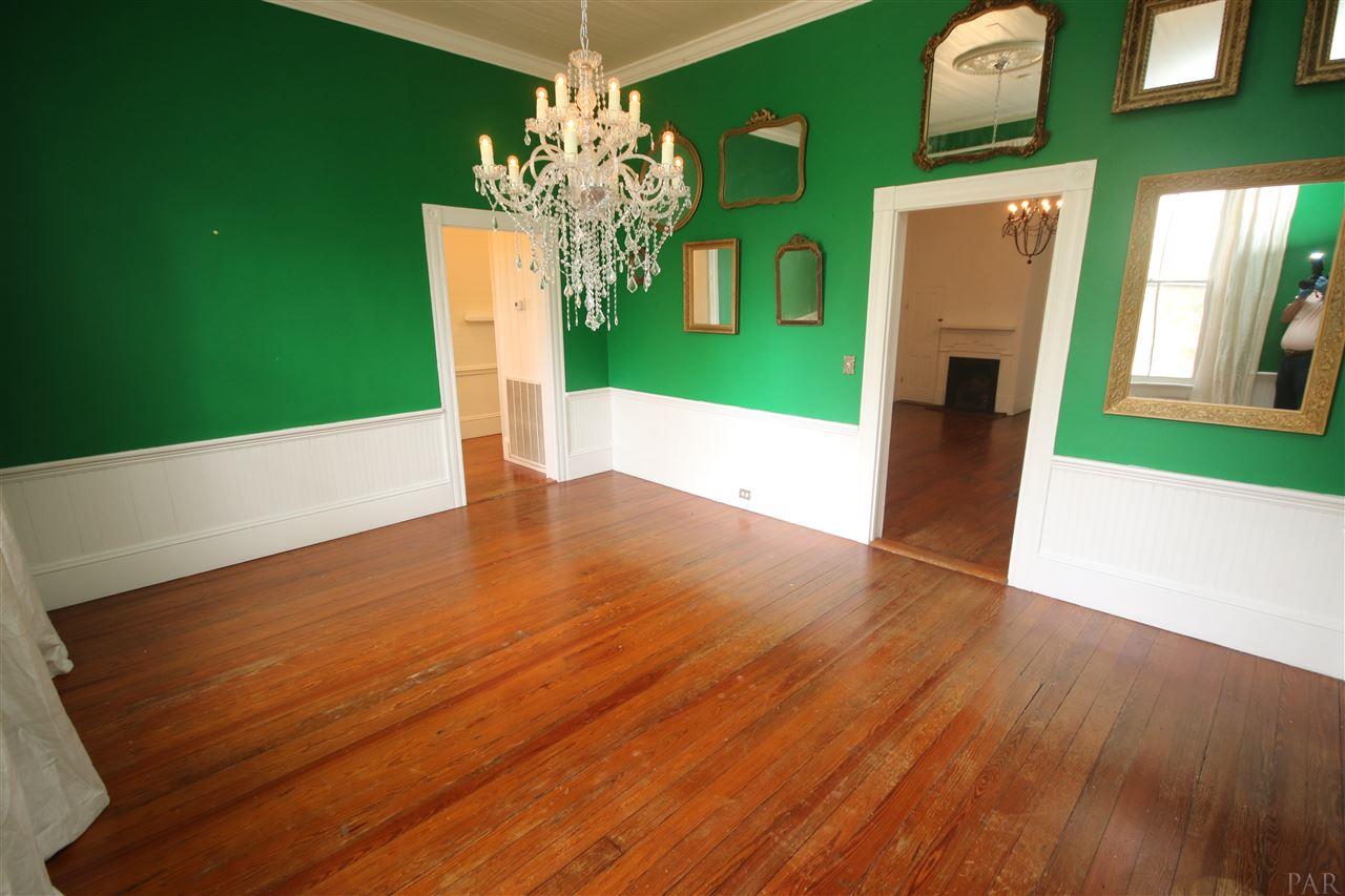 6810 Berryhill Road Milton, FL 32570 - Photo 14 of 50 the left. Living room through door to the right