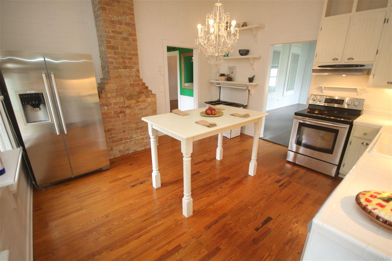 6810 Berryhill Road Milton, FL 32570 - Photo 17 of 50 butler's pantry. Love the exposed brick chimney!