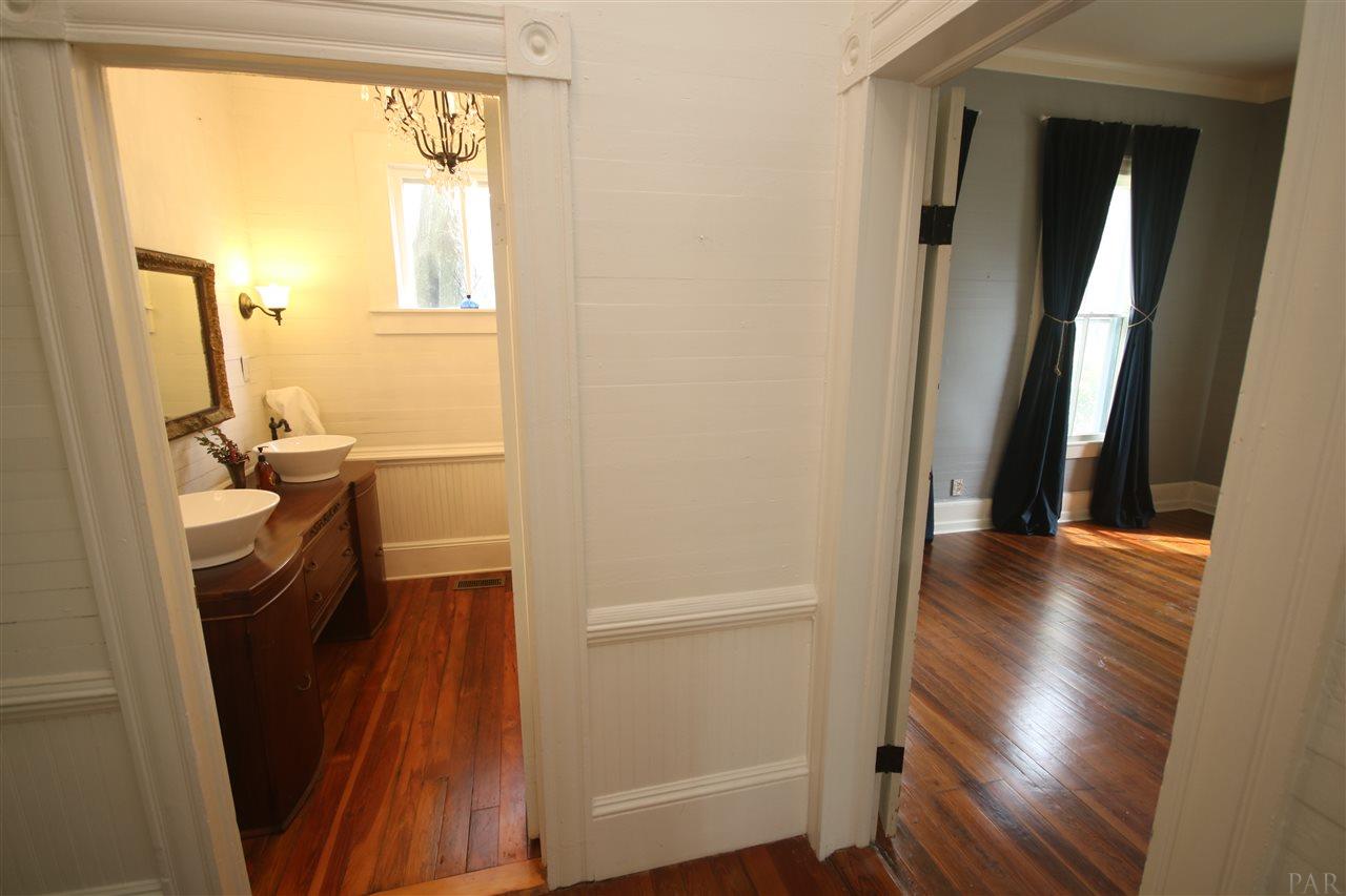 6810 Berryhill Road Milton, FL 32570 - Photo 22 of 50 & master bdrm (R) from hall. Parlor to your back.