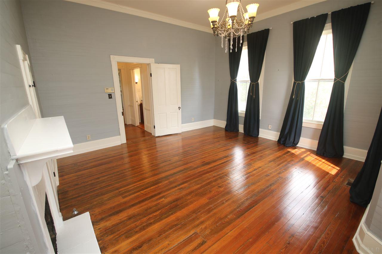 6810 Berryhill Road Milton, FL 32570 - Photo 28 of 50 flooring & 11' ceiling. Bathroom just outside door