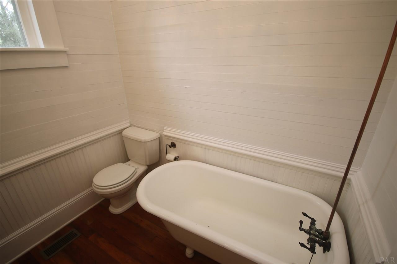 6810 Berryhill Road Milton, FL 32570 - Photo 33 of 50 soaking! Hearth pine flooring in here as well.