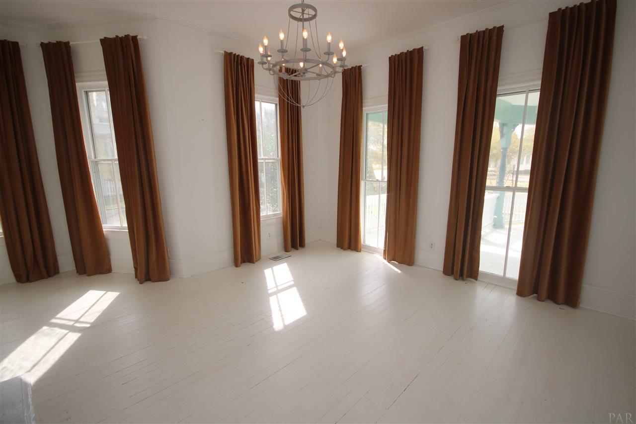 6810 Berryhill Road Milton, FL 32570 - Photo 34 of 50 length velvet drapes to compliment 11' ceiling.