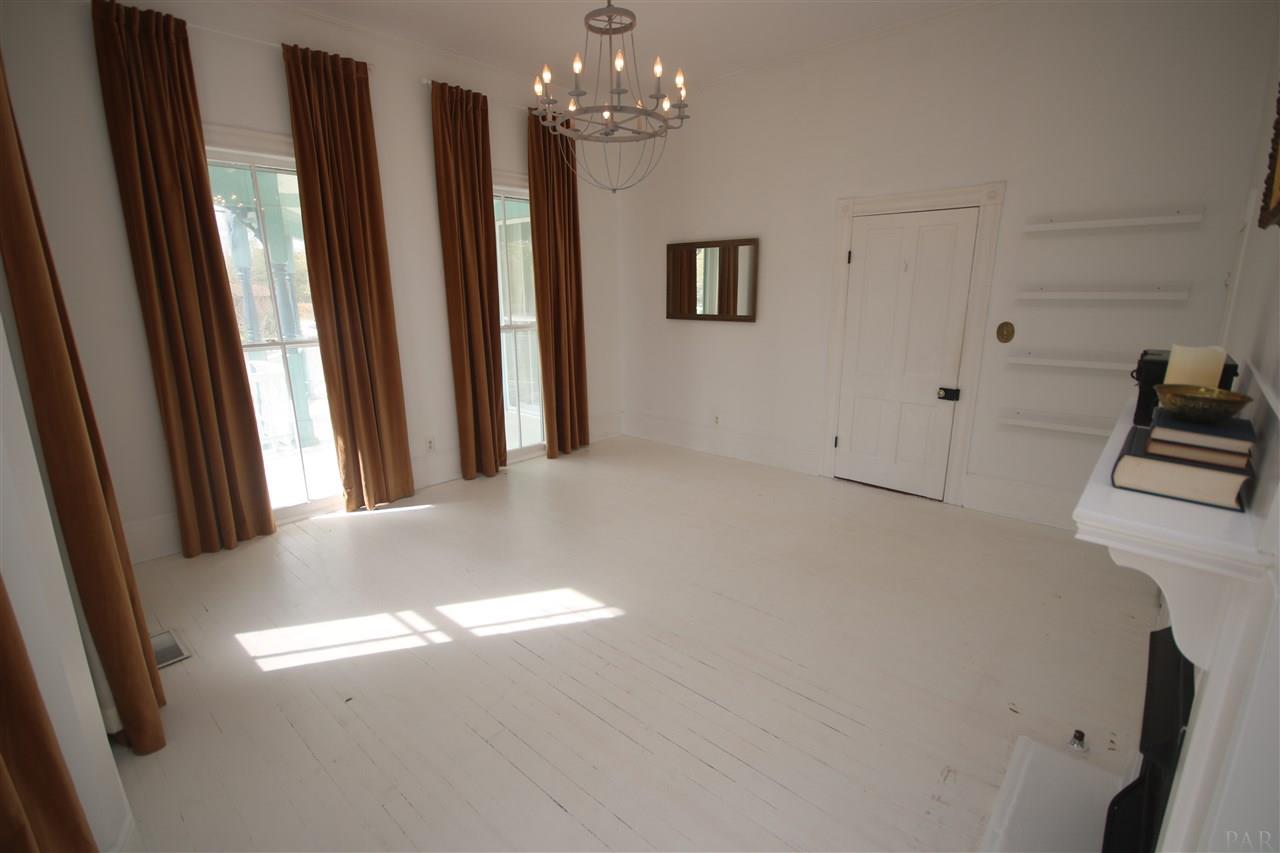 6810 Berryhill Road Milton, FL 32570 - Photo 37 of 50 of the home looking out to the wrap around porch.