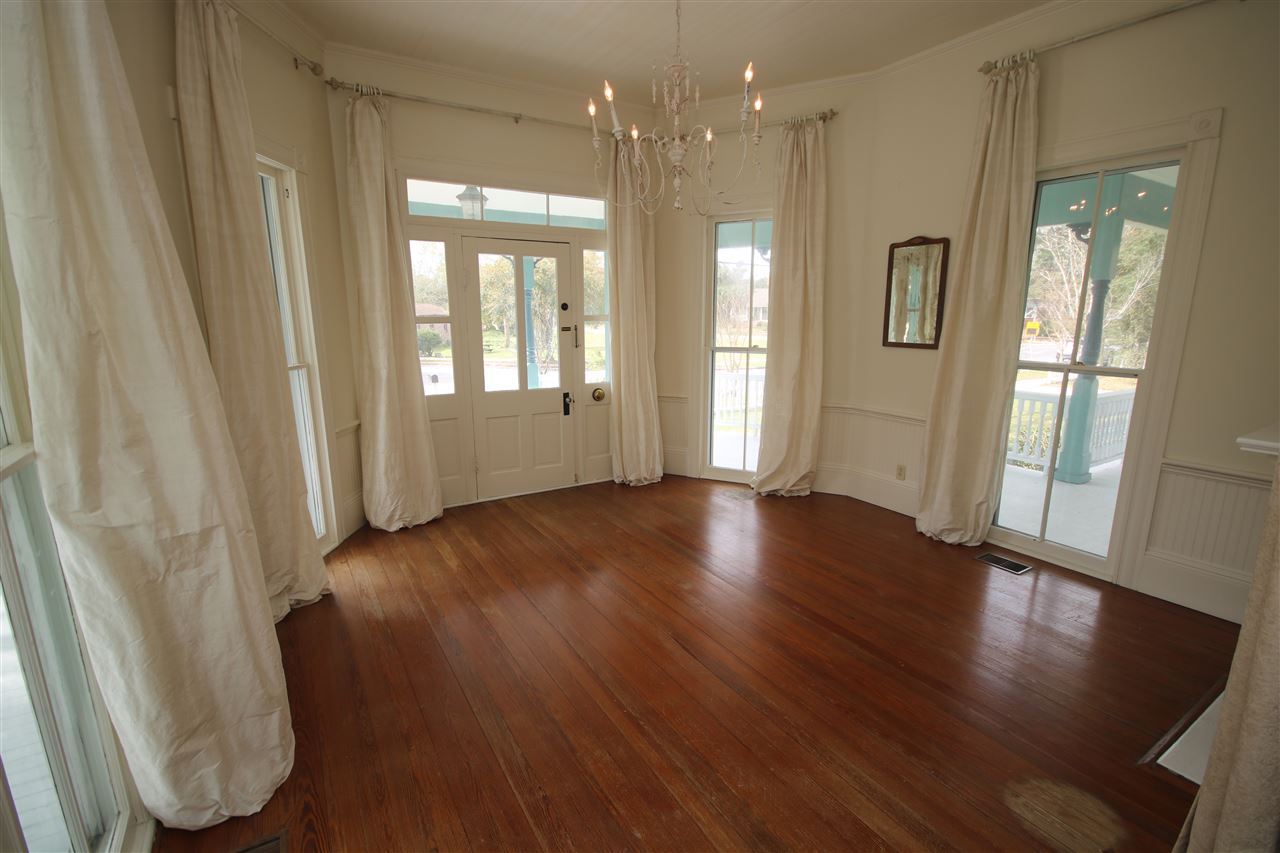 6810 Berryhill Road Milton, FL 32570 - Photo 7 of 50 flooring. Gorgeous period chandeliers throughout.