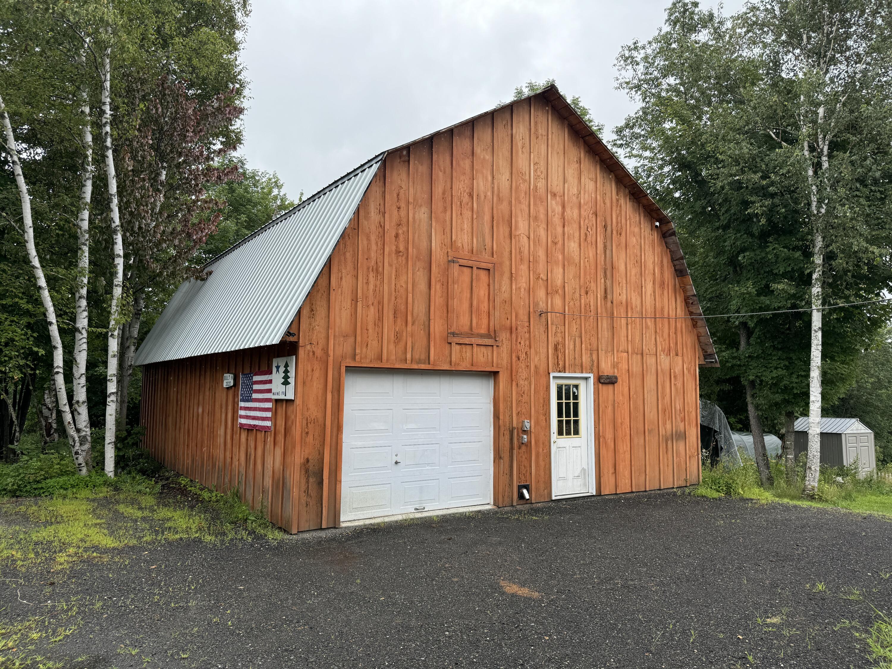 934 Milo Road Sebec, ME 04481 - Photo 51 of 52 Front of Detached Garage