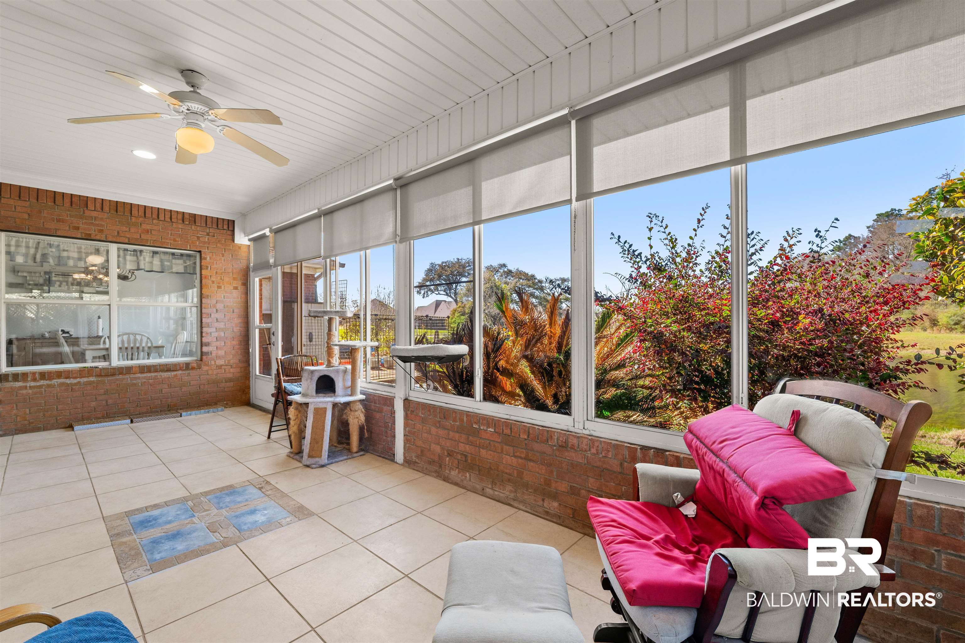 237 Hemingway Loop Foley, AL 36535 - Photo 22 of 49 Sunroom with a healthy amount of sunlight and a ceiling fan