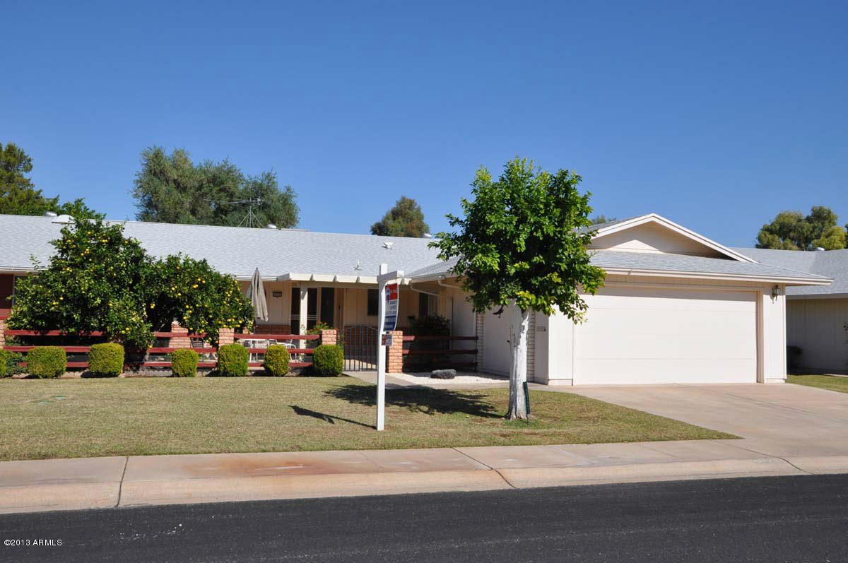10722 West Hatcher Road Sun City, AZ 85351 - Photo 1 of 24 Front View