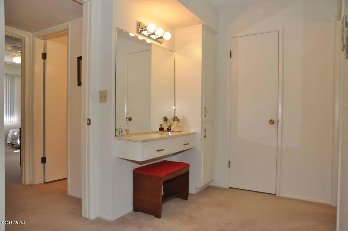 10722 West Hatcher Road Sun City, AZ 85351 - Photo 18 of 24 Master Bedroom-Vanity