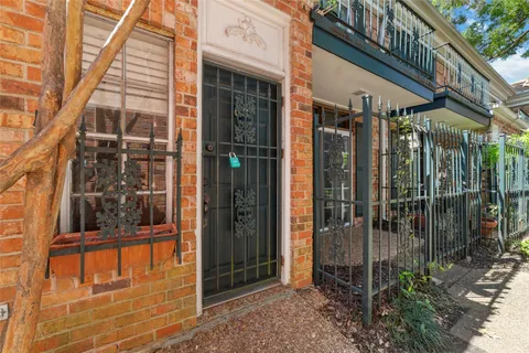 a view of a brick building with a large window