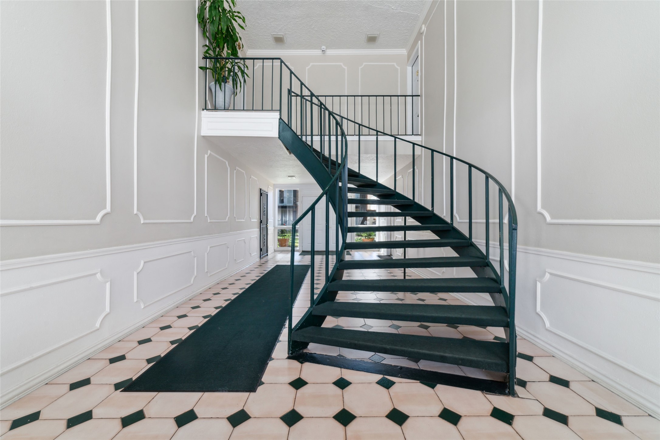 3400 Timmons Lane, Unit 68 Houston, TX 77027 - Photo 20 of 20 a view of entryway with wooden floor
