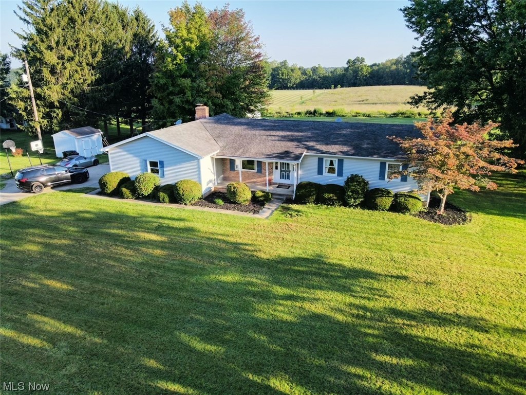 15508 West Calla Road Beloit, OH 44609 - Photo 2 of 19 Ranch-style home featuring a front lawn