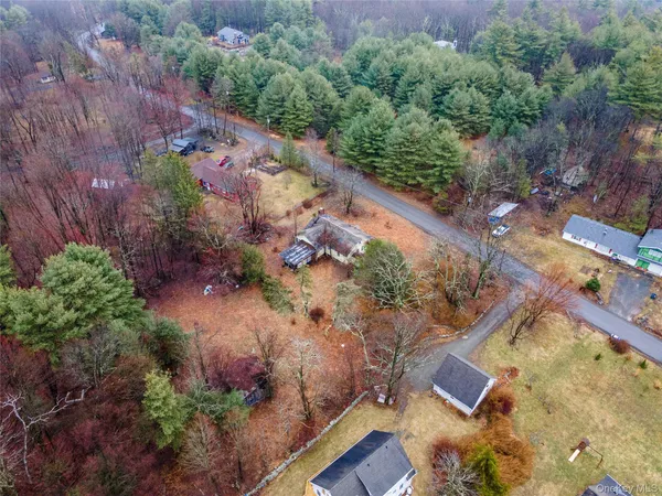 an aerial view of residential house with outdoor space
