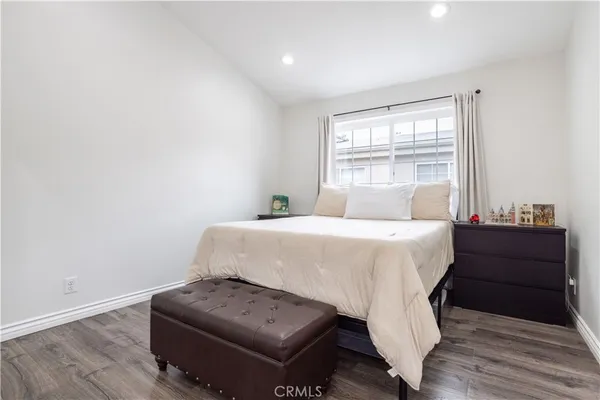 a room with a bed and a window