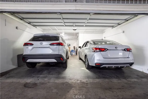 a car and car parked in a garage