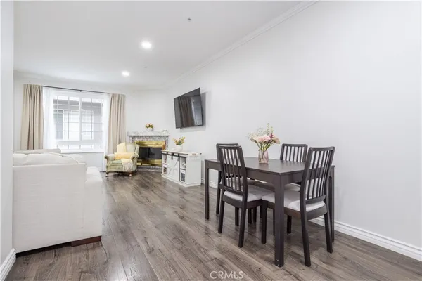 a view of a livingroom with furniture and a window