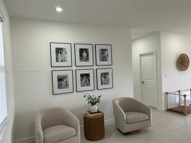 a kitchen with stainless steel appliances granite countertop a stove microwave and sink