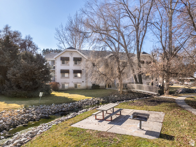 215 South 1050th West, Unit 10 Provo, UT 84601 - Photo 32 of 38 View of home's community with a patio