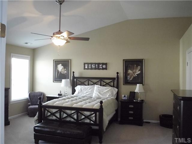 5802 St Agnes Way Raleigh, NC 27612 - Photo 12 of 25 Vaulted ceiling in spacious master bedroom with HUGE walk-in closet. Additional closet/storage attached. Must See Master Bedroom