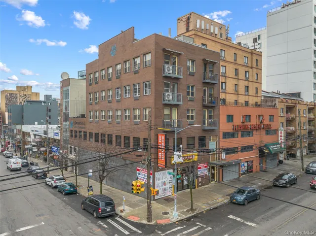 a front view of a building with street view