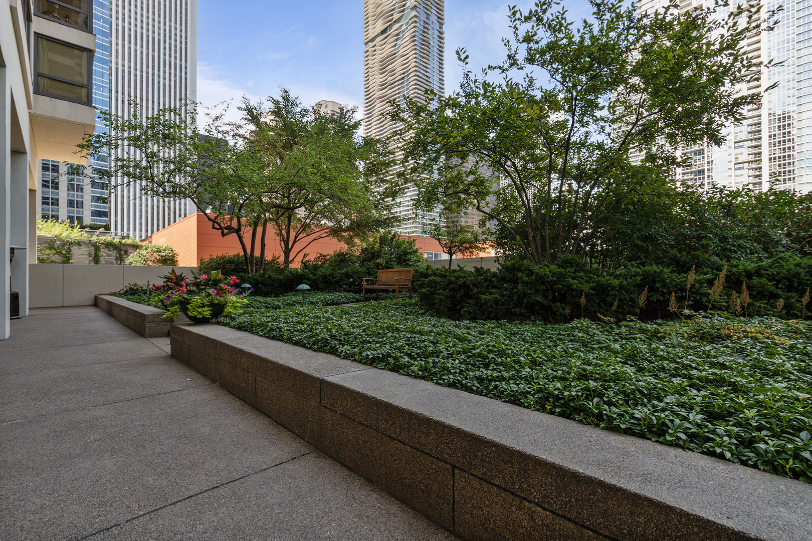 360 East Randolph Street, Unit 3105 Chicago, IL 60601 - Photo 27 of 28 a view of a garden with potted plants